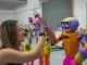 Andromeda Co-founder Grace Brown with Abi the robot.